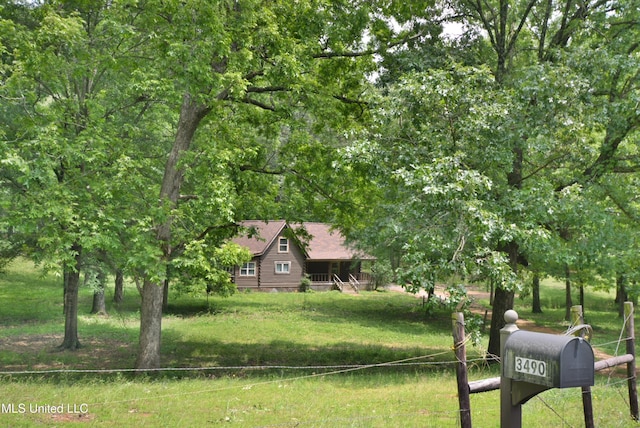 3490 Sherrod Rd, Nesbit, MS 38651 - view of front facade featuring a front lawn