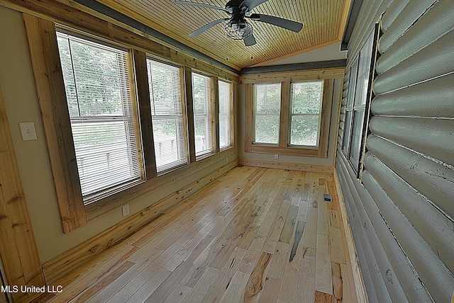 3490 Sherrod Rd, Nesbit, MS 38651 - unfurnished sunroom featuring vaulted ceiling, plenty of natural light, and hardwood / wood-style flooring