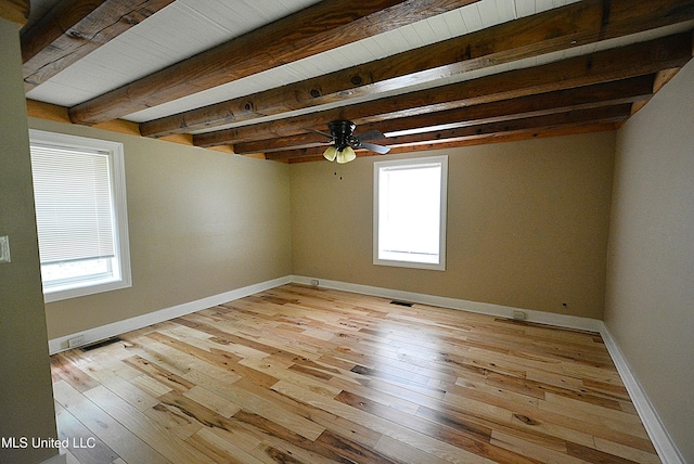 3490 Sherrod Rd, Nesbit, MS 38651 - spare room featuring ceiling fan, light wood-style floors, beam ceiling, and baseboards