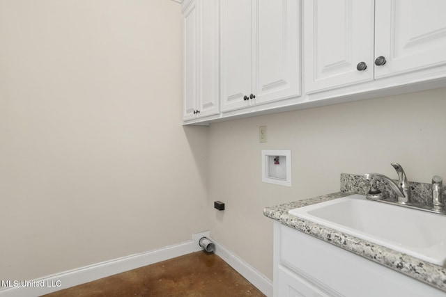 laundry area with hookup for a washing machine, cabinet space, baseboards, and hookup for an electric dryer