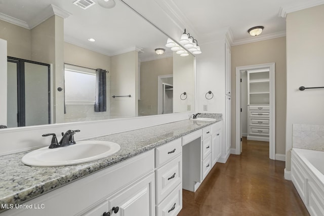 bathroom featuring finished concrete flooring, a bath, double vanity, crown molding, and a walk in closet