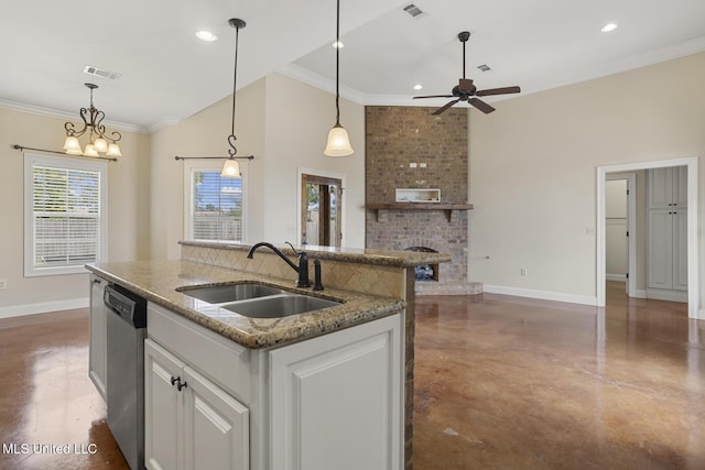 kitchen with a sink, finished concrete flooring, baseboards, stainless steel dishwasher, and recessed lighting
