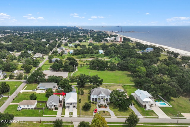 drone / aerial view with a water view