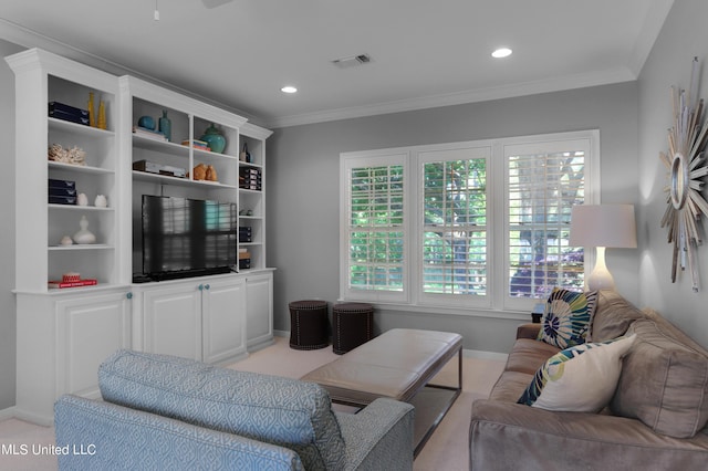 living room with ornamental molding