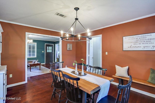 dining space with a chandelier, baseboards, crown molding, and dark wood-type flooring