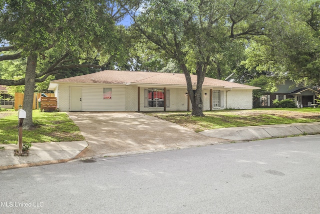 3306 Nottingham Rd, Ocean Springs, MS 39564 - single story home with driveway and brick siding