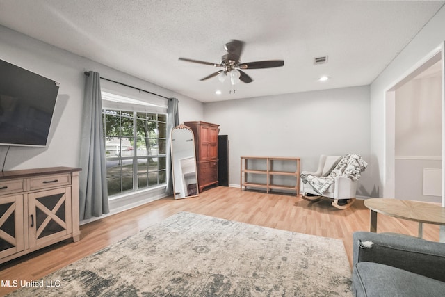 3306 Nottingham Rd, Ocean Springs, MS 39564 - sitting room with light wood finished floors, ceiling fan, and recessed lighting