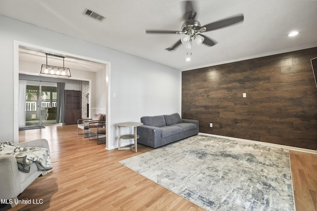 3306 Nottingham Rd, Ocean Springs, MS 39564 - living area with ceiling fan and wood finished floors
