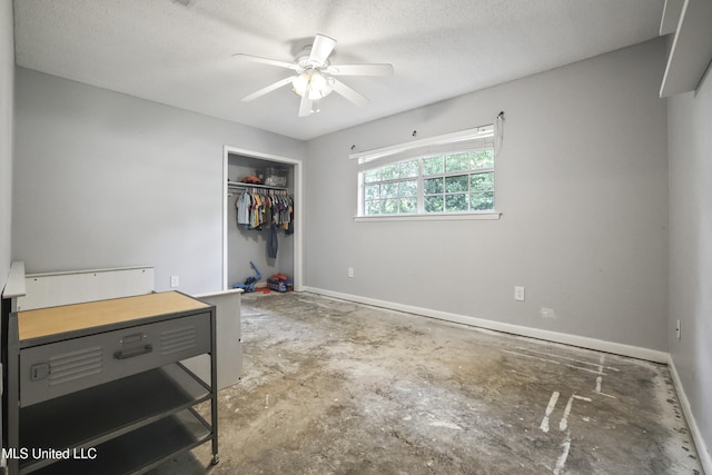 3306 Nottingham Rd, Ocean Springs, MS 39564 - empty room featuring ceiling fan, a textured ceiling, and unfinished concrete floors