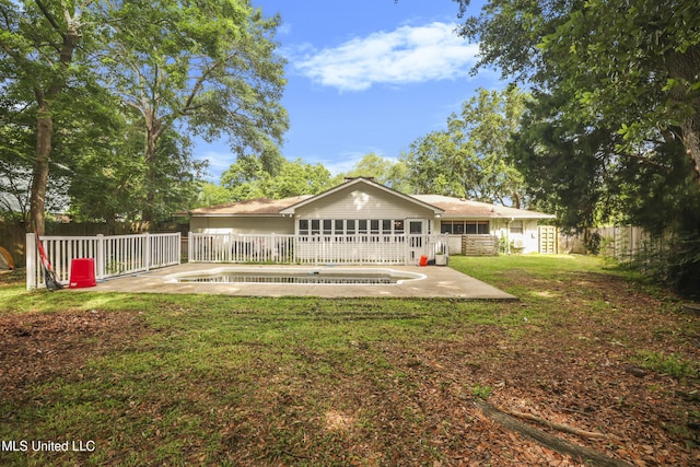 3306 Nottingham Rd, Ocean Springs, MS 39564 - rear view of property featuring a patio area and a fenced backyard