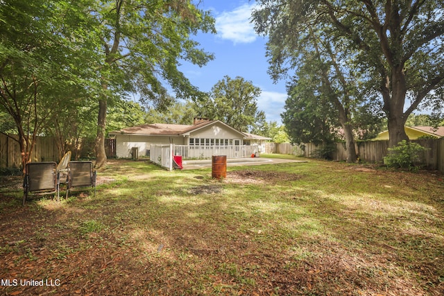 3306 Nottingham Rd, Ocean Springs, MS 39564 - fenced backyard featuring a patio