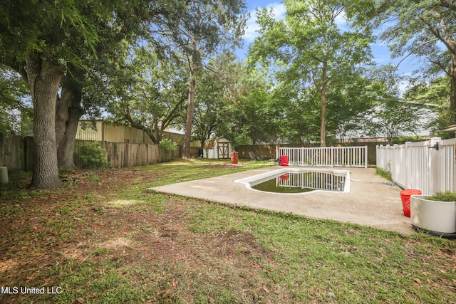 3306 Nottingham Rd, Ocean Springs, MS 39564 - fenced backyard featuring a shed and a patio area