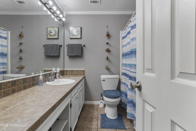 306 Jamaica Dr, Ocean Springs, MS 39564 - full bath with toilet, a textured ceiling, crown molding, and vanity