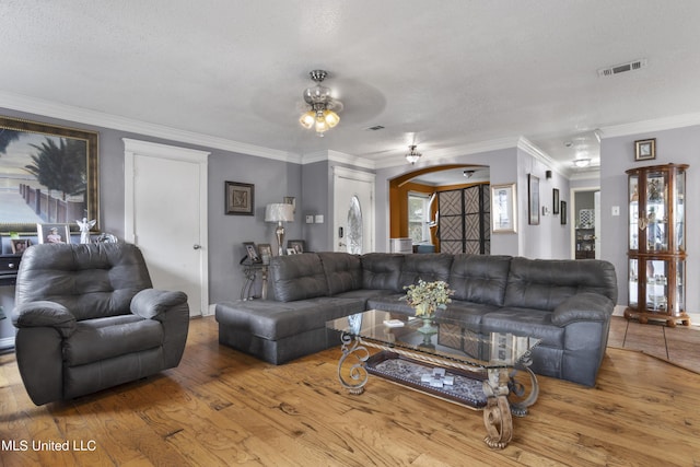 306 Jamaica Dr, Ocean Springs, MS 39564 - living area featuring wood finished floors, visible vents, ceiling fan, and a textured ceiling