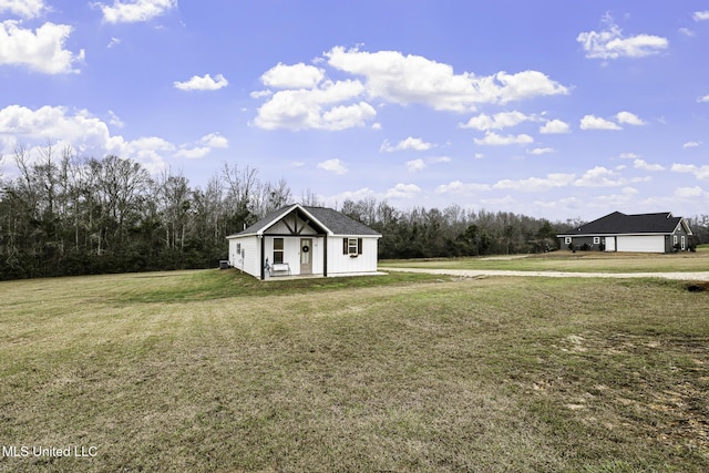 view of outdoor structure featuring a garage and an outbuilding