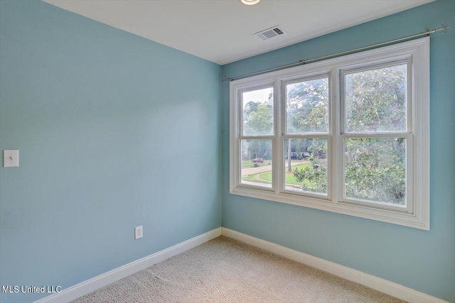 1771 Plantation Blvd, Jackson, MS 39211 - spare room featuring baseboards, visible vents, and light carpet