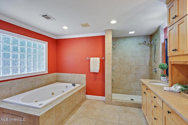 bathroom with vanity, tile patterned floors, and shower with separate bathtub