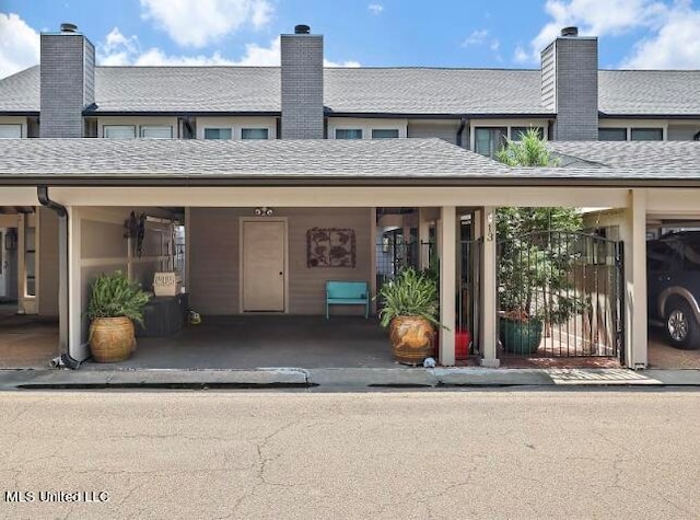 view of front of house with a carport