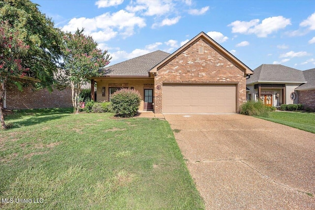 view of front of home featuring a garage and a front lawn