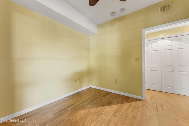 2230 Beach Dr Unit 205, Gulfport, MS 39507 - spare room with a ceiling fan, light wood finished floors, and baseboards