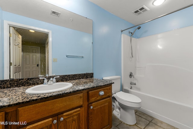 2230 Beach Dr Unit 205, Gulfport, MS 39507 - bathroom with tile patterned flooring, vanity, toilet, and tub / shower combination