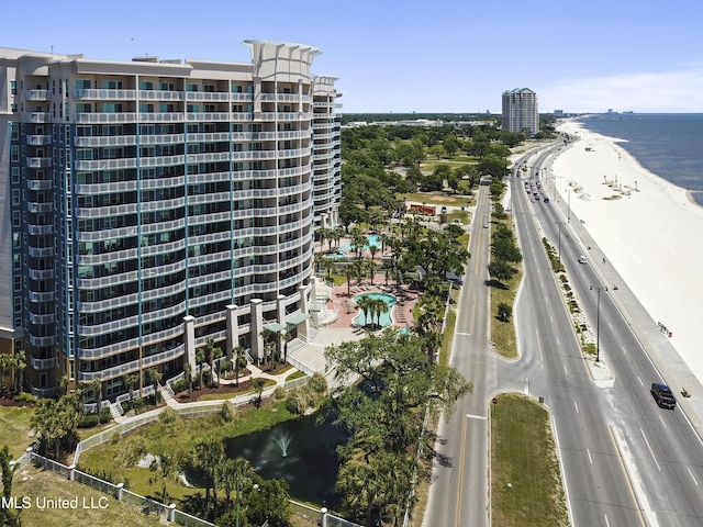 2230 Beach Dr Unit 205, Gulfport, MS 39507 - view of property location featuring a nearby body of water, apartment complex / building, a pool area, and a major roadway