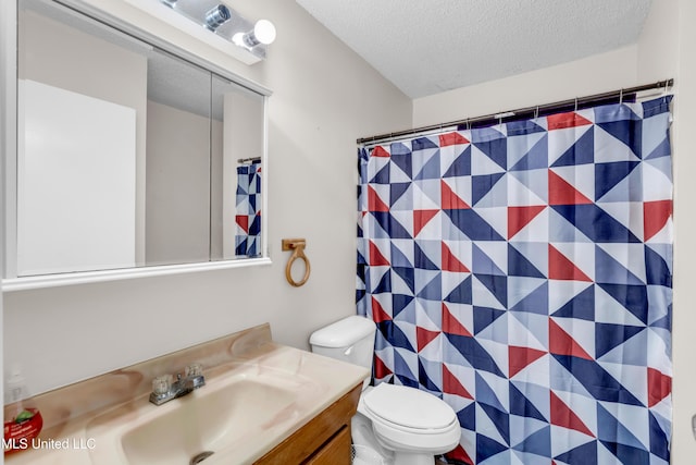 5608 Claresholm Dr, Gautier, MS 39553 - bathroom featuring vanity, a textured ceiling, toilet, and a shower with curtain