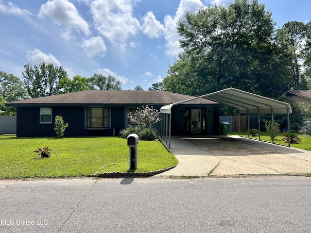 5608 Claresholm Dr, Gautier, MS 39553 - view of front of home with concrete driveway and a carport