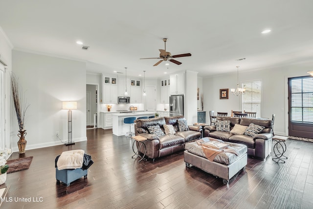 35 Enclave Cir, Ridgeland, MS 39157 - living room with ceiling fan, dark wood-style flooring, a chandelier, recessed lighting, and baseboards