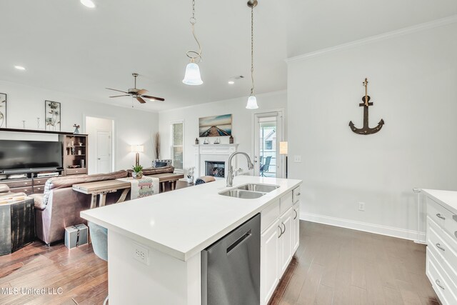 35 Enclave Cir, Ridgeland, MS 39157 - kitchen with a sink, stainless steel dishwasher, open floor plan, ornamental molding, and light countertops