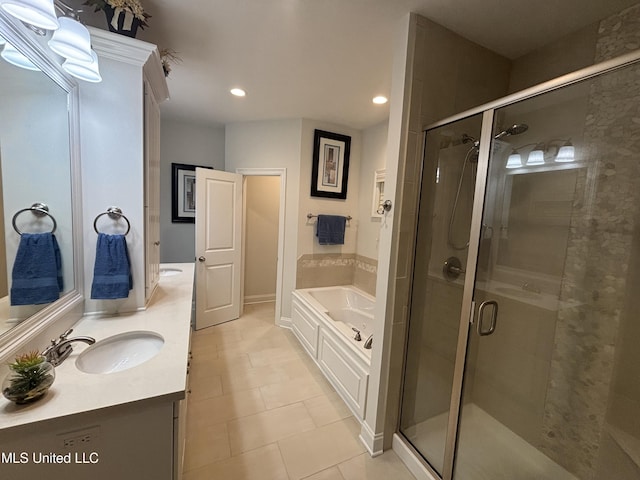 35 Enclave Cir, Ridgeland, MS 39157 - full bathroom with a garden tub, a stall shower, vanity, tile patterned flooring, and recessed lighting