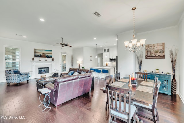 35 Enclave Cir, Ridgeland, MS 39157 - dining area featuring ornamental molding, a chandelier, a ceiling fan, recessed lighting, and a fireplace