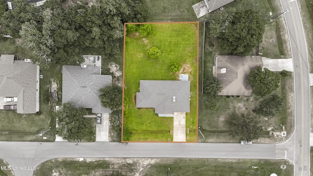 aerial view of residential area with property parcel outlined
