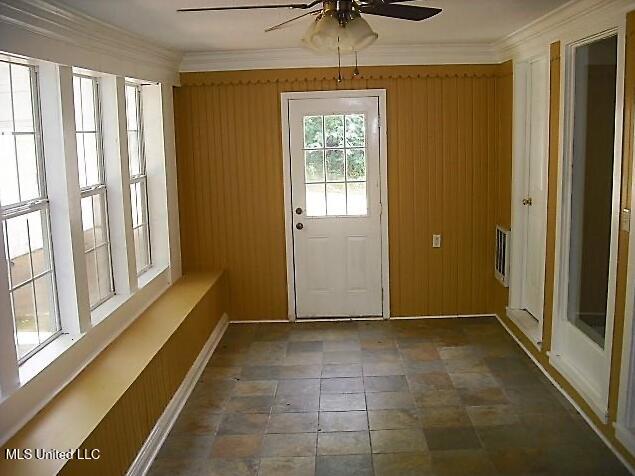 1105 Military Rd, Columbus, MS 39701 - doorway to outside featuring ceiling fan and ornamental molding