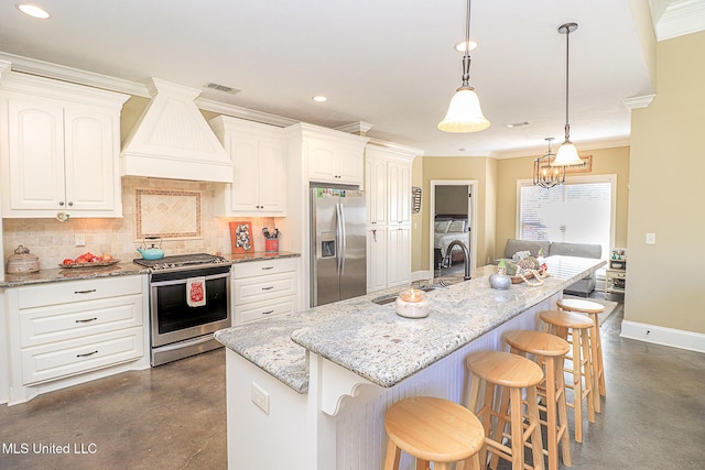 kitchen with baseboards, custom range hood, stainless steel appliances, concrete flooring, and backsplash