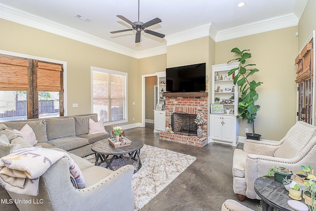 living area featuring ceiling fan, baseboards, finished concrete flooring, a brick fireplace, and crown molding