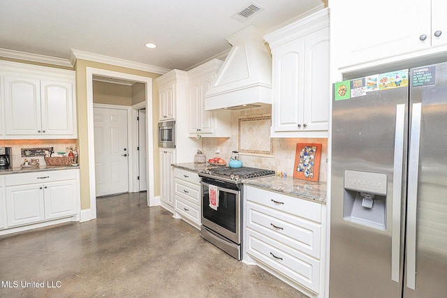 kitchen featuring stainless steel appliances, white cabinets, light stone counters, and custom exhaust hood