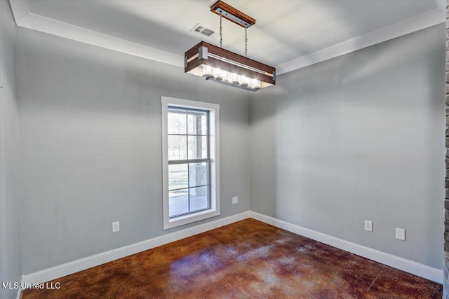 unfurnished room with crown molding