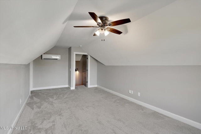 additional living space featuring light carpet, an AC wall unit, ceiling fan, and lofted ceiling