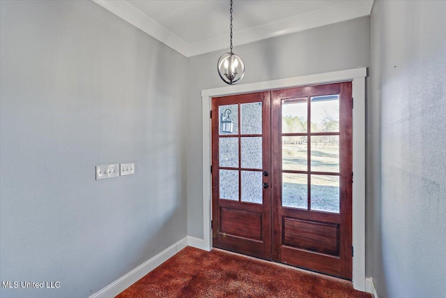 doorway to outside with french doors and a notable chandelier