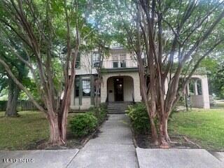 56 John St, Clarksdale, MS 38614 - obstructed view of property with a front yard