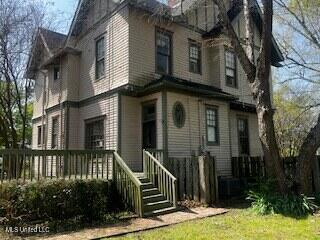 56 John St, Clarksdale, MS 38614 - view of front of home featuring a front lawn