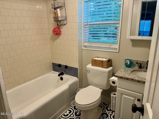 bathroom with bathing tub / shower combination, vanity, and toilet