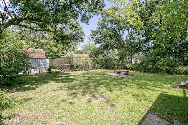 view of yard with fence