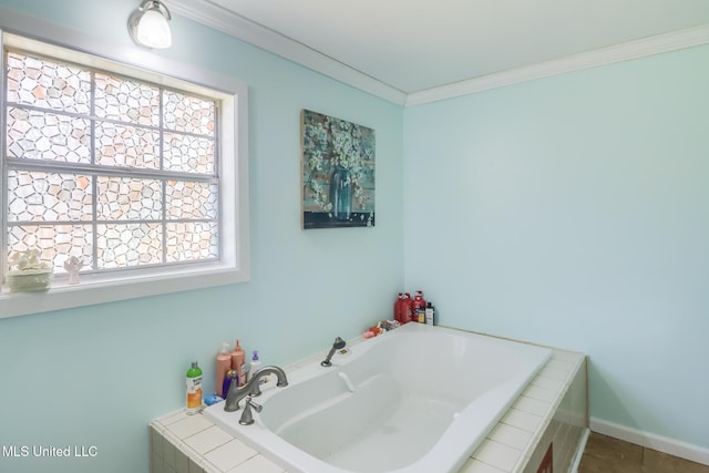 bathroom featuring baseboards, a bath, and ornamental molding