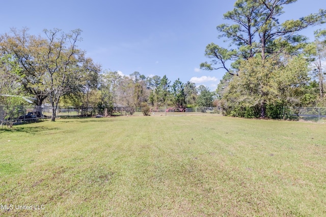view of yard featuring fence