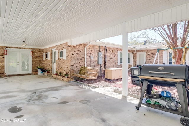 view of patio with french doors and area for grilling