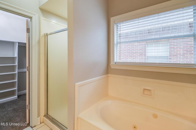 2616 Rue Palafox, Biloxi, MS 39531 - full bath featuring a shower stall and a tub with jets