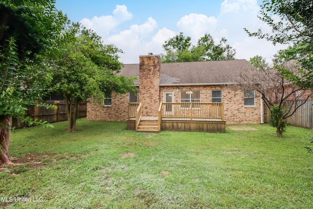2616 Rue Palafox, Biloxi, MS 39531 - back of house with brick siding, a shingled roof, a chimney, and a deck