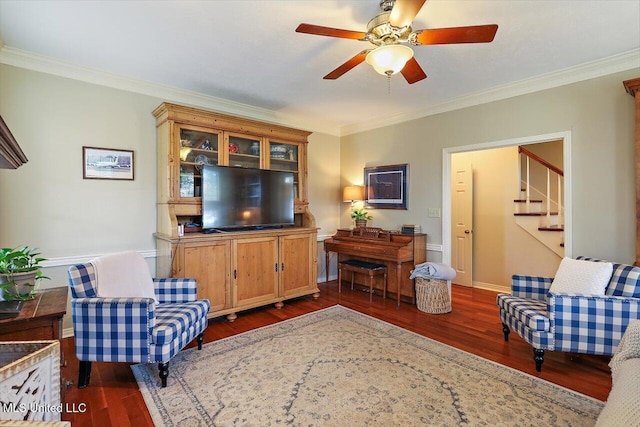 911 Tetbury Pl, Brandon, MS 39047 - living room featuring dark wood finished floors, crown molding, ceiling fan, stairs, and baseboards
